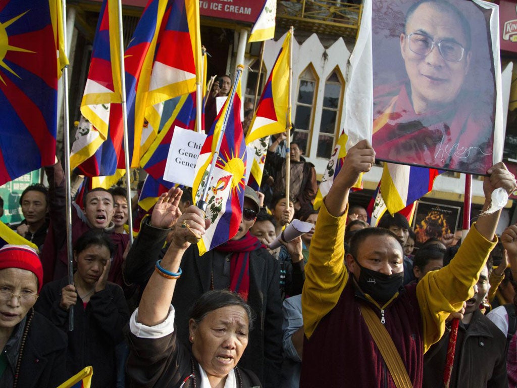 Exiled Tibetans protest in Dharamsala, India, on Thursday