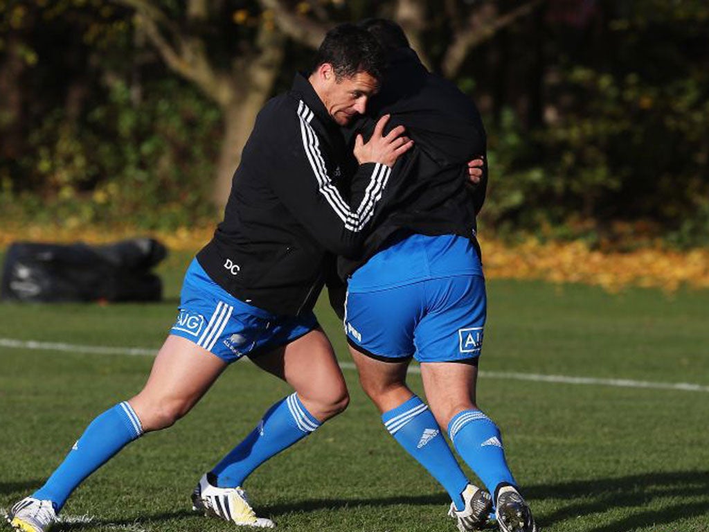 Dan Carter (left) tackles Piri Weepu in training in Edinburgh