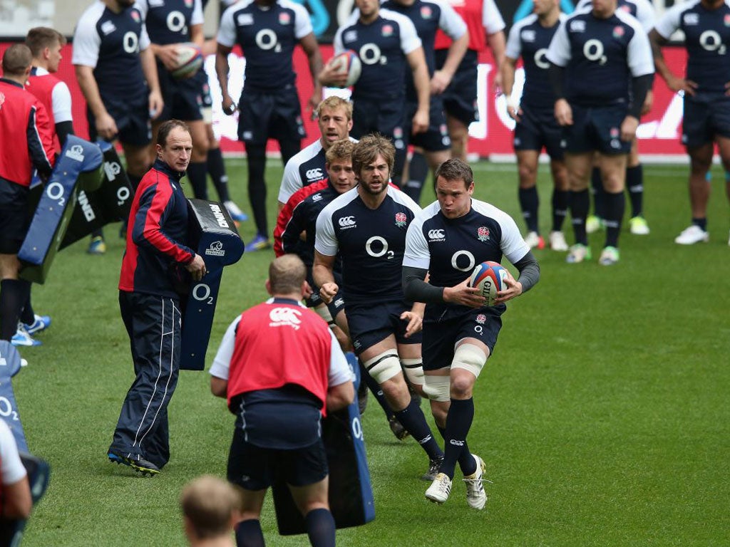 Tom Johnson gets on the ball during the England captain’s run at Twickenham yesterday