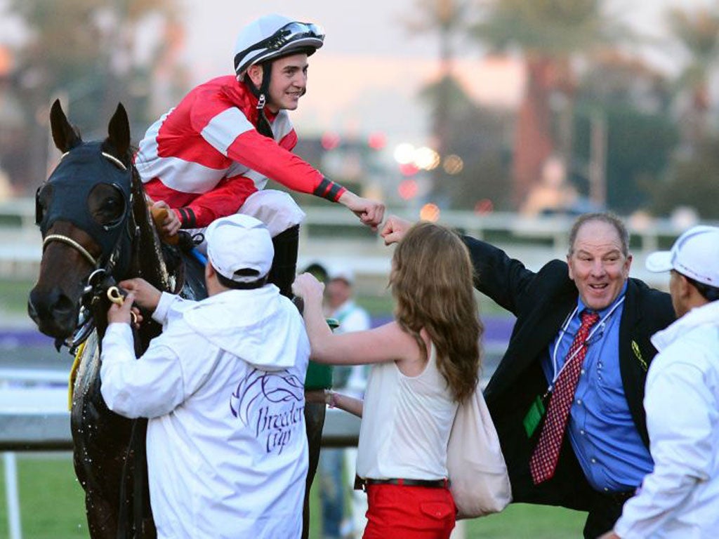 Jockey Brian Hernandez Jnr celebrates aboard Fort Larned after winning the Breeders’ Cup Classic