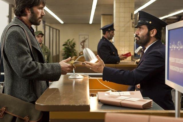 Ben Affleck, left, plays CIA agent Tony Mendez in 'Argo', which he also directed