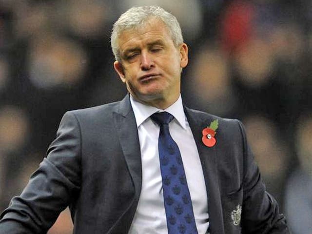 Brave face: Mark Hughes says his side must start taking their chances