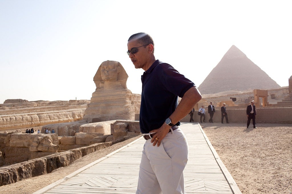 In this photo provided by The White House, President Barack Obama tours the Egypt's Great Sphinx of Giza (L) and the Pyramid of Khafre