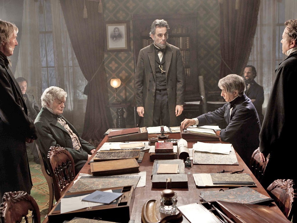 Daniel Day-Lewis, center, as Abraham Lincoln, in a scene from the film, 'Lincoln'