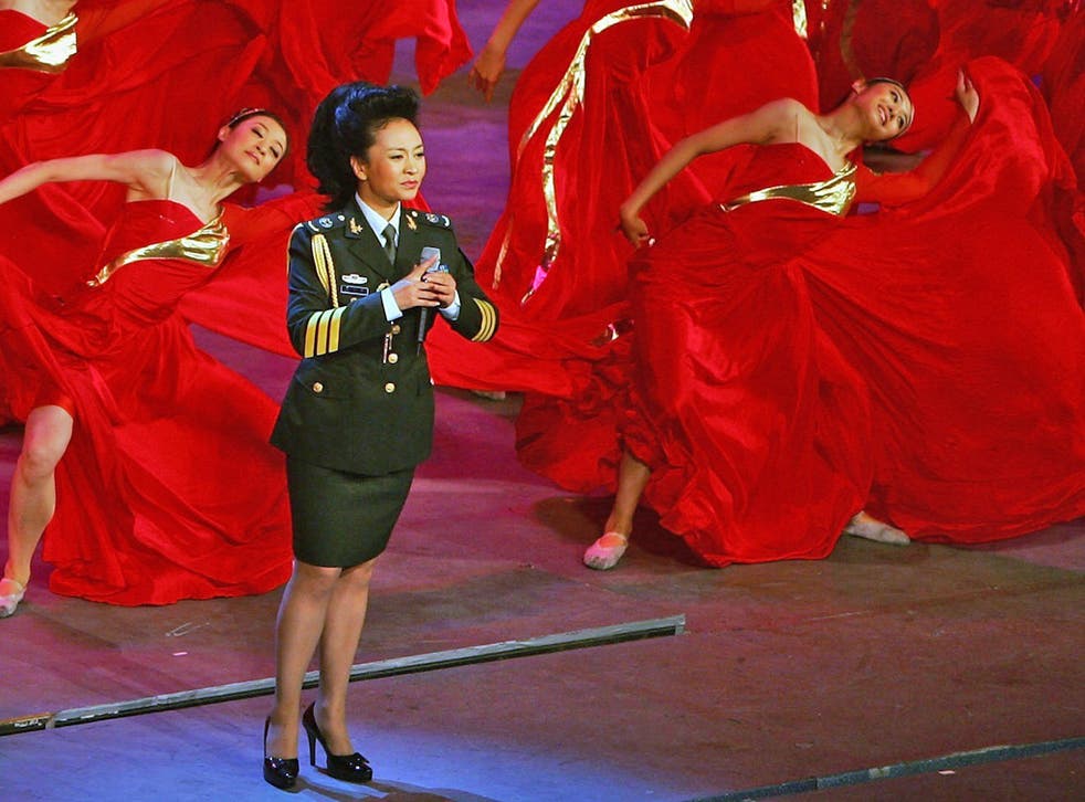 Peng Liyuan, wife of Xi Jinping, performing