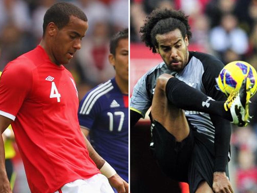 Tom Huddlestone has changed since his last England cap as (left) he takes on Japan and (right) against Manchester City yesterday