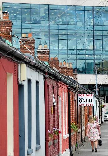 IRELAND MORTGAGES: A row of cottages in Dublin, Ireland, in 2011. “I’m not calling any massive recovery, but people are going to look back and see a lot of missed opportunities in Ireland if they had the cash,” says the head of one property broker.
