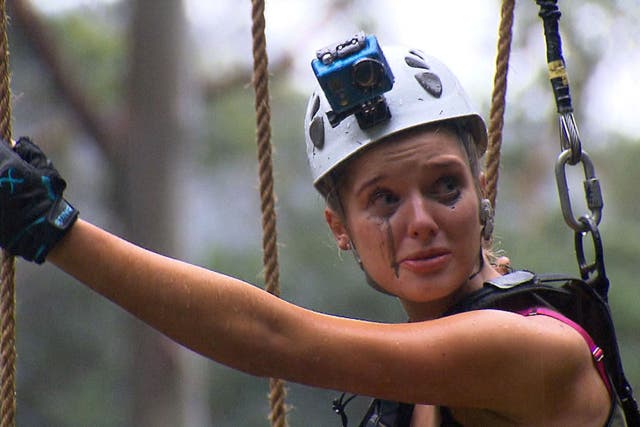 Helen Flanagan in the High Wire challenge. The tearful actress, who admitted to having a dislike of heights, found herself high above the rainforest perching precariously on the narrow wire, which she had to cross to the other side and into camp.