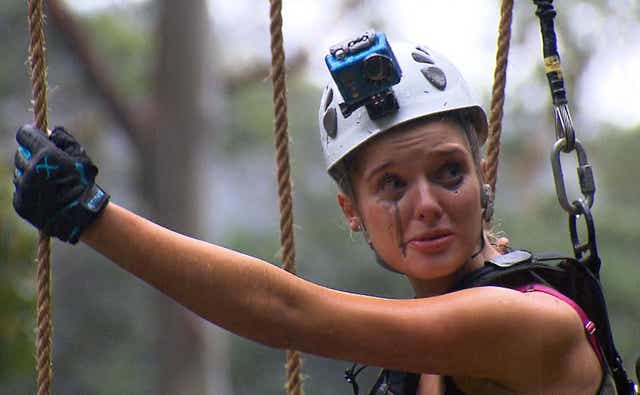 Helen Flanagan in the High Wire challenge. The tearful actress, who admitted to having a dislike of heights, found herself high above the rainforest perching precariously on the narrow wire, which she had to cross to the other side and into camp.
