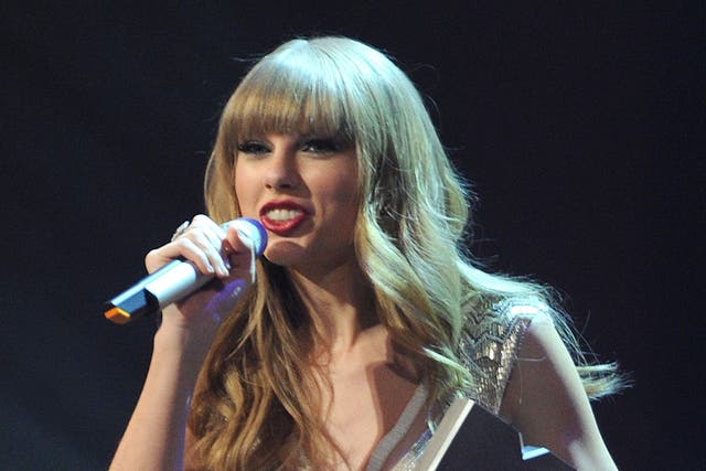 Taylor Swift wore a cream and silver vintage-looking delicate gown designed by J.Mendel at the MTV EMA