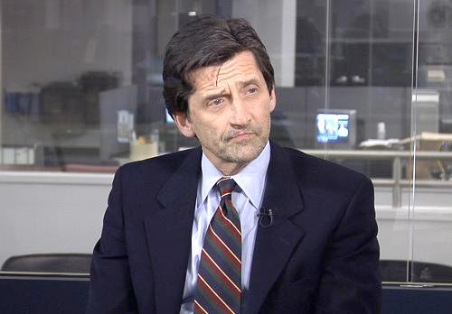 PETRAEUS GHOSTWRITER: Washington Post editor Vernon Loeb, co-author of the David Petraeus biography "All In," is interviewed for the Post's video feed Monday in the Washington newsroom. Loeb wrote that he was surprised by the admission of an affair between Petraeus and Paula Broadwell, co-author of "All In."