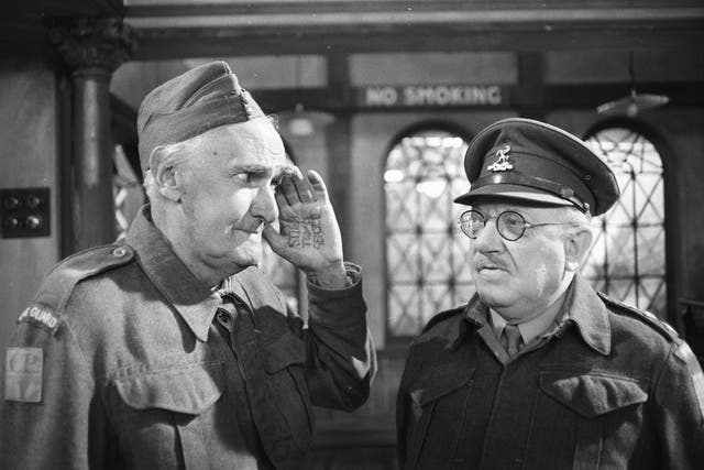 John Laurie (Private Frazer) and Arthur Lowe (Captain Mainwaring) during an episode of the BBC comedy series 'Dad's Army' filmed on July 30, 1977.