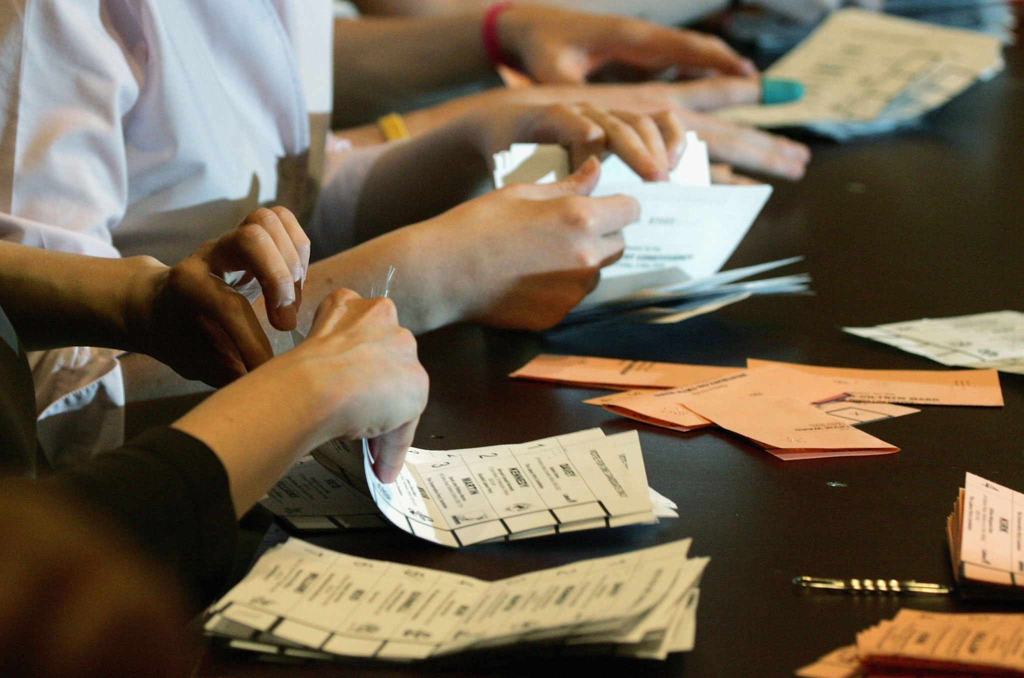 The first ballot papers are sorted during the 2005 Parliamentary Election count for the Bristol West Constituency at Bristol City Council House on May 6, 2005 in Bristol, England.