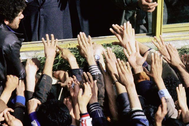 The saviour? Ayatollah Khomeini returns to Iran during the revolution of 1979