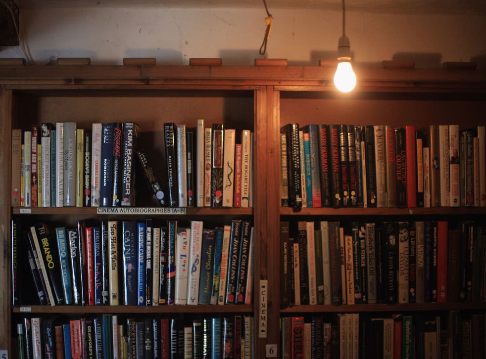 A bare lightbulb illuminates secondhand books in one of the many Hay-on-Wye bookshops during the Hay Festival on May 31, 2011 in Hay-on-Wye, Wales.