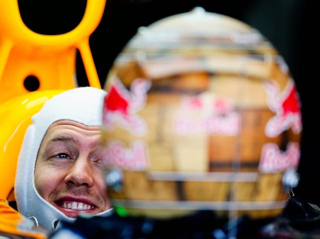 Driving force: Red Bull’s Sebastian Vettel looks relaxed in the pit lane during the first training session in Texas