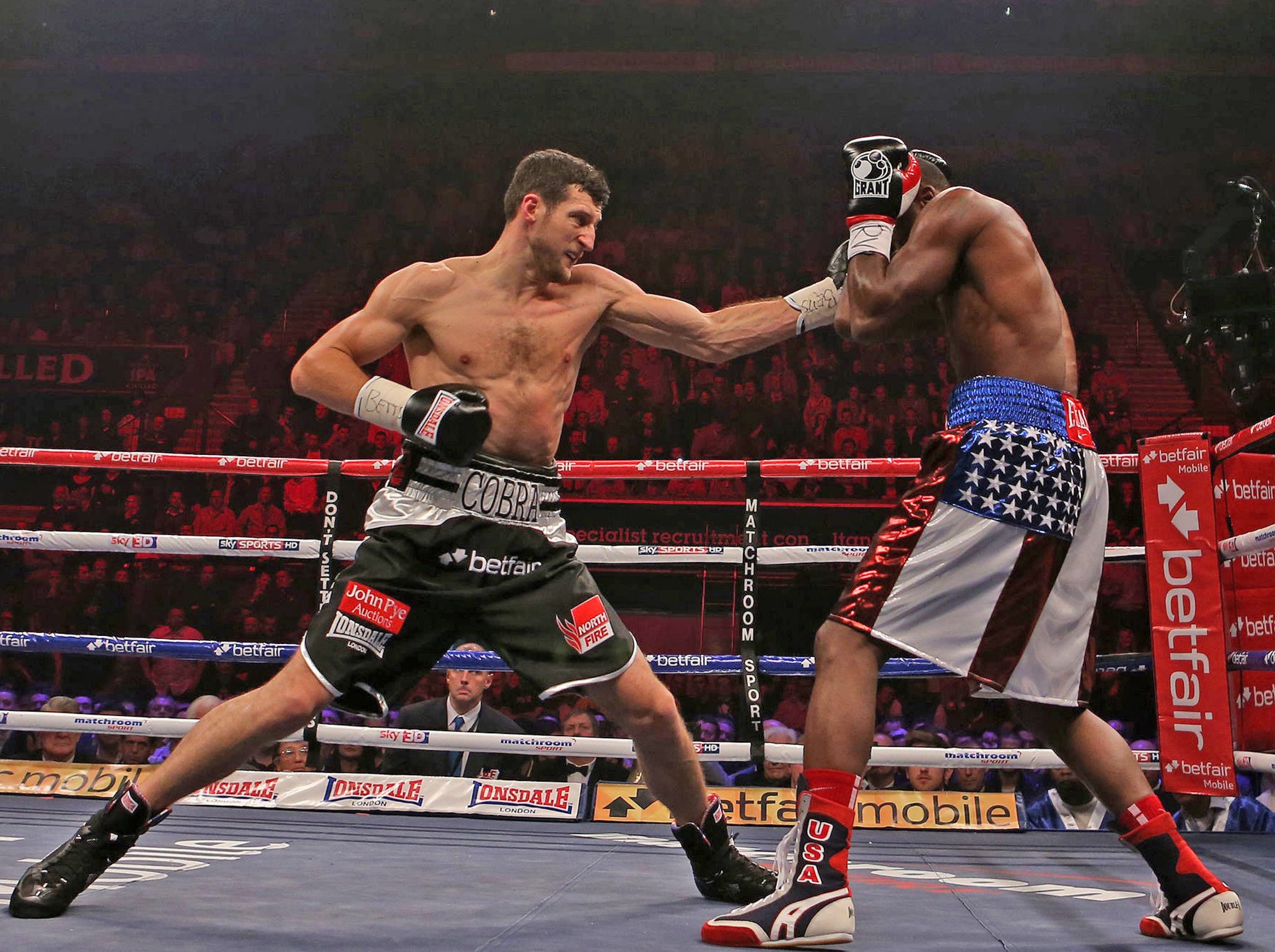 Carl Froch (left) in action against Yusaf Mack during the IBF World Super Middleweight Title fight