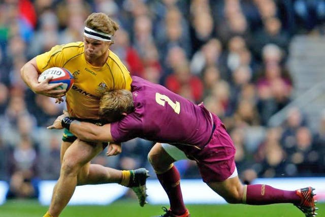Michael Hooper is tackled by Tom Youngs at Twickenham
