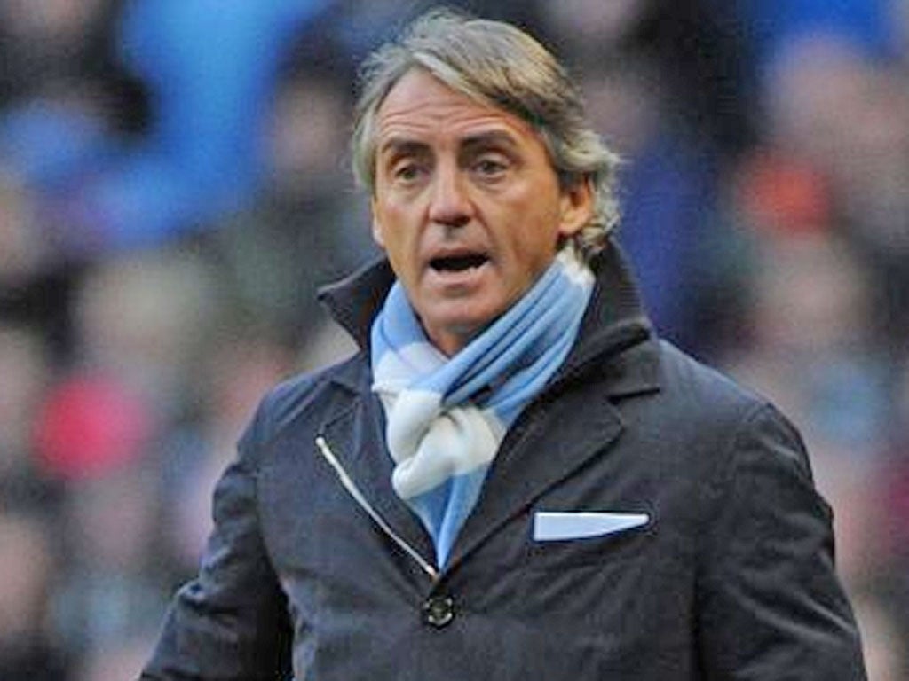 Roberto Mancini has demanded his Manchester City side must improve if they are to beat Real Madrid