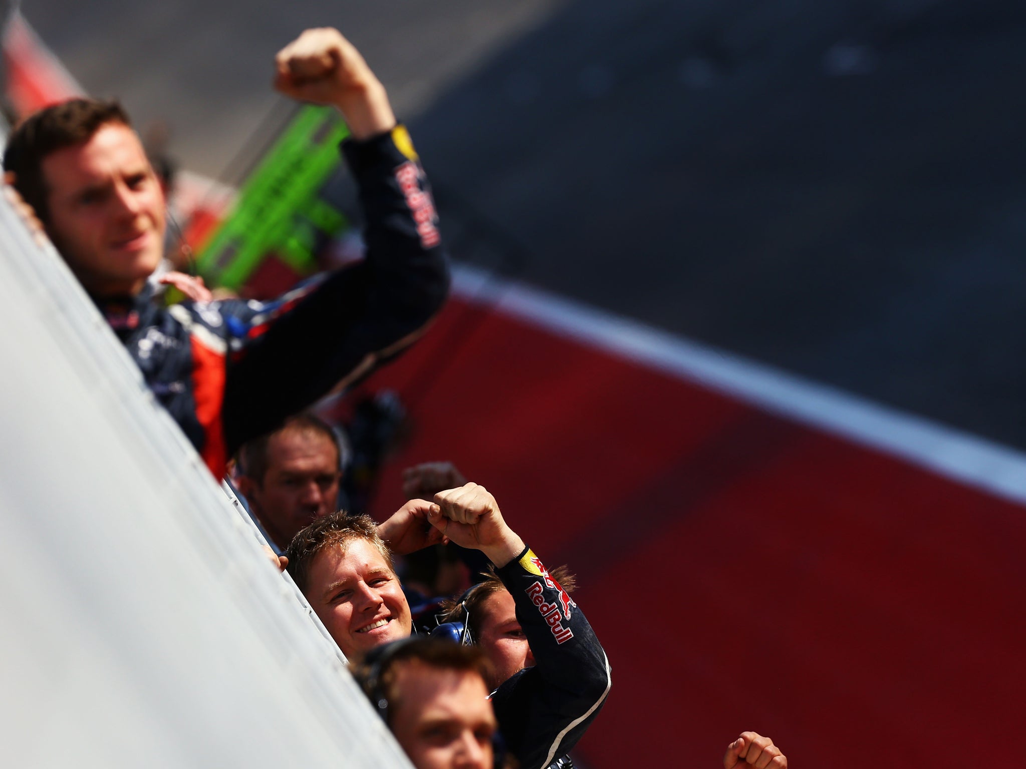 Red Bull Racing team celebrate after Sebastian Vettels second place finish secures them their third consecutive Constructors Championship