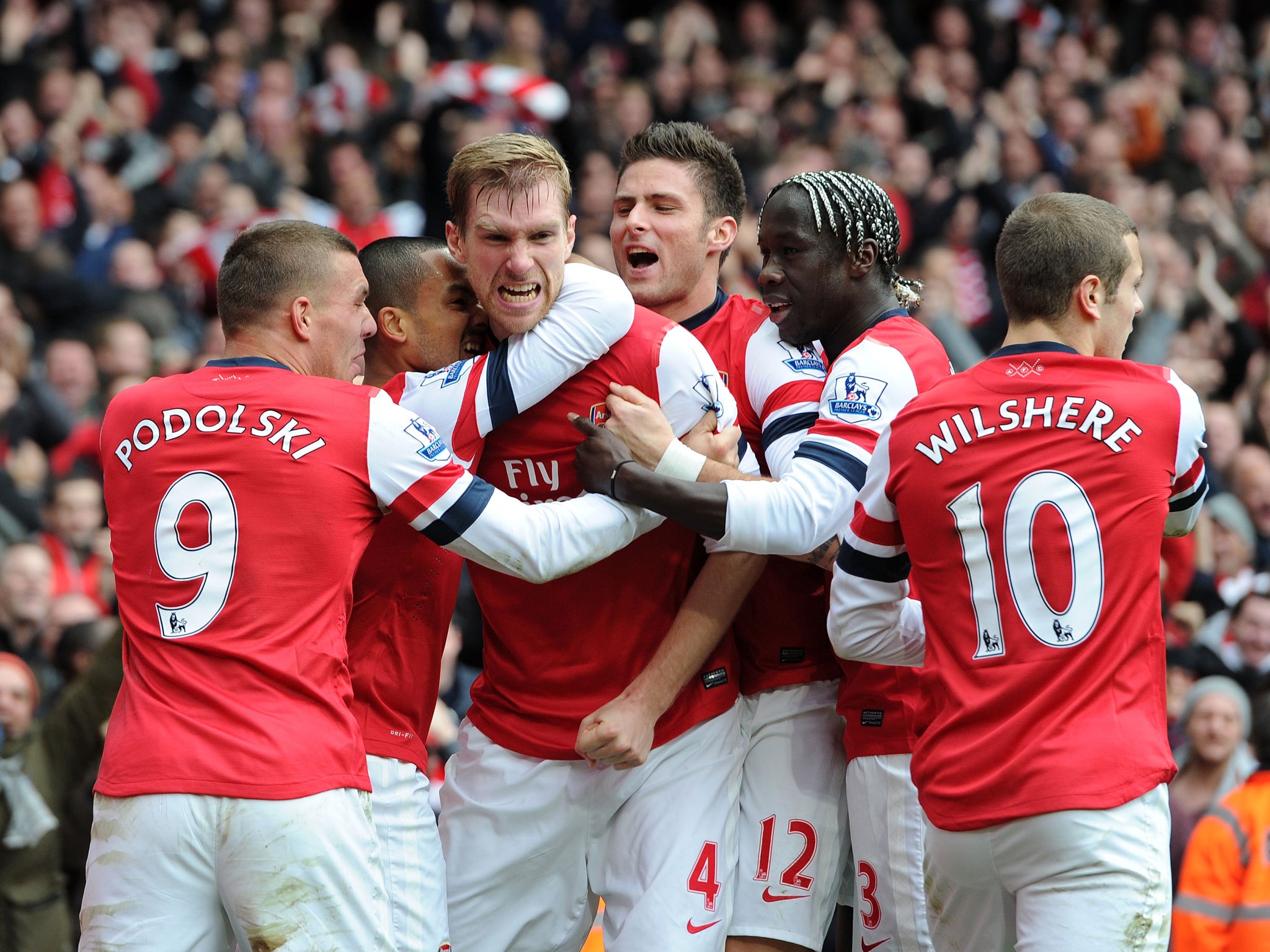The Gunners came from a goal behind to beat 10-man Spurs at the Emirates