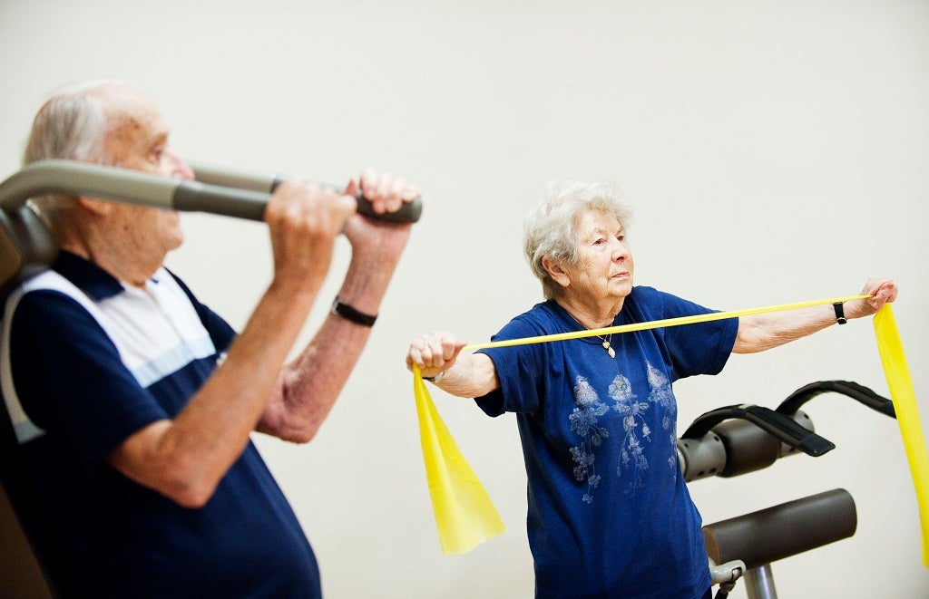 In a picture taken on November 11, 2011, Karl Erik Wettergren (L), 93 and Margareta Nordin, 92, work out