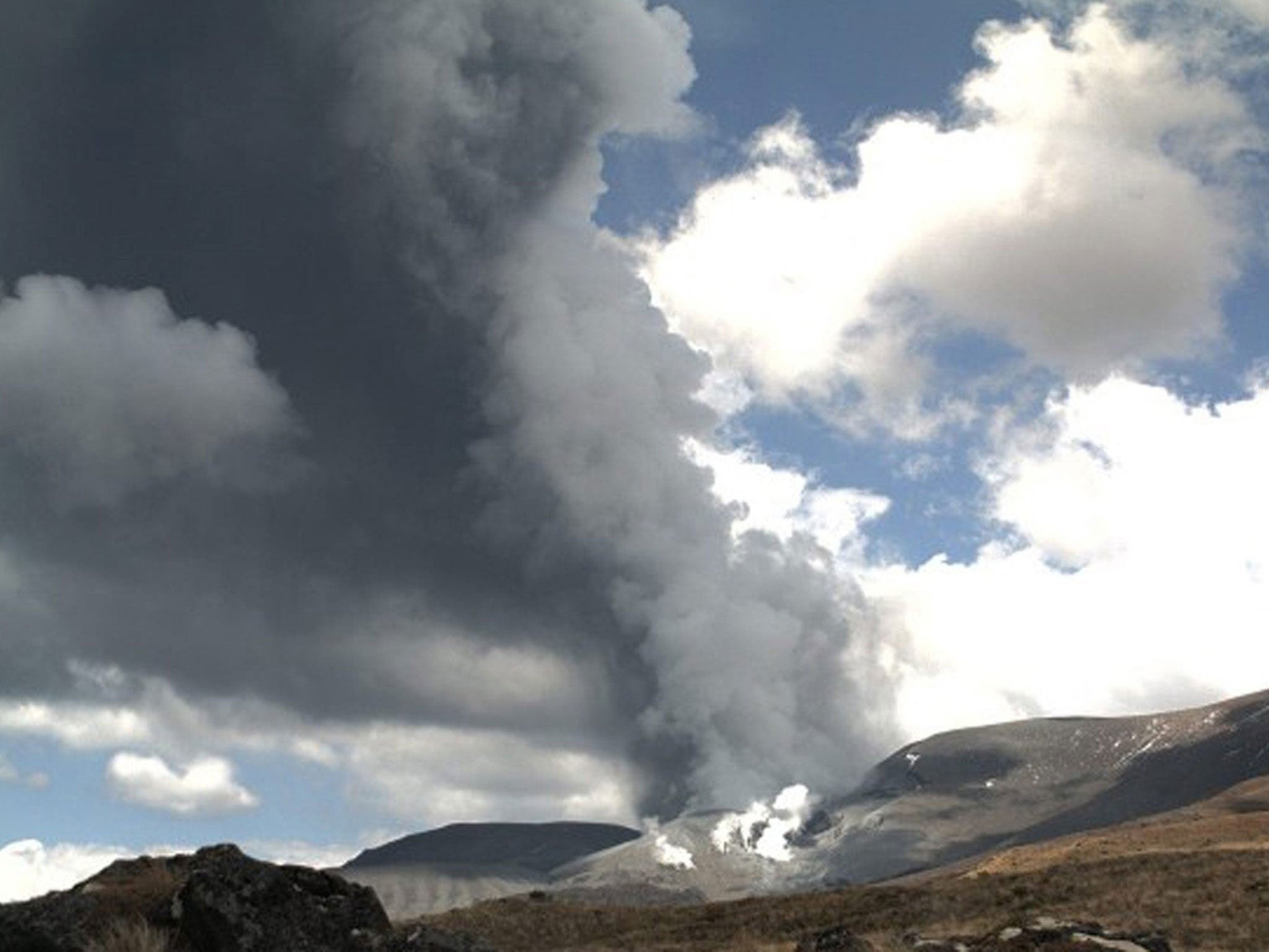 The eruption of Mount Tongariro sent a dark ash plume into the sky