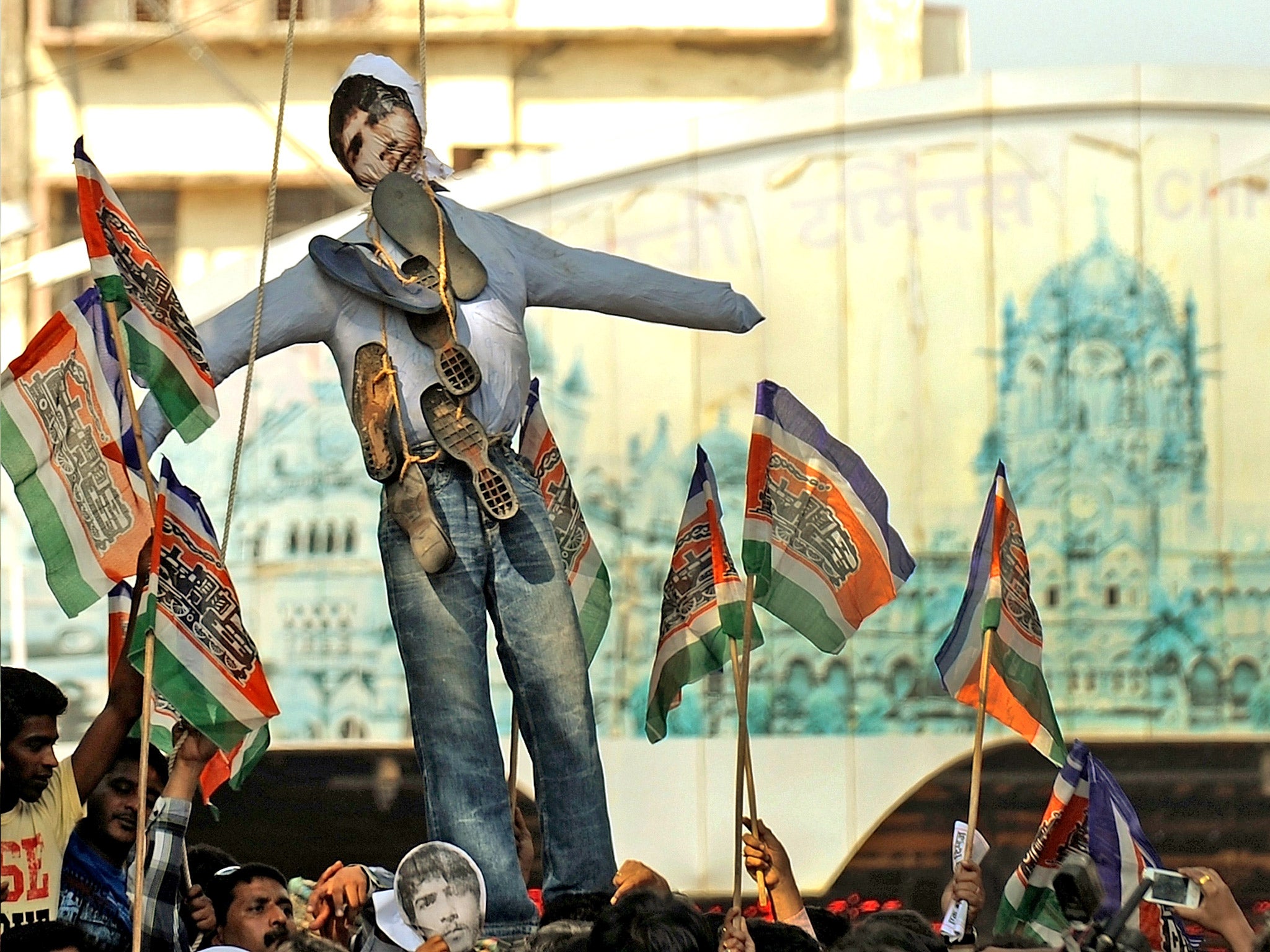 India's Maharashtra Navnirman Sena (MNS) activists hang an effigy of Ajmal Kasab