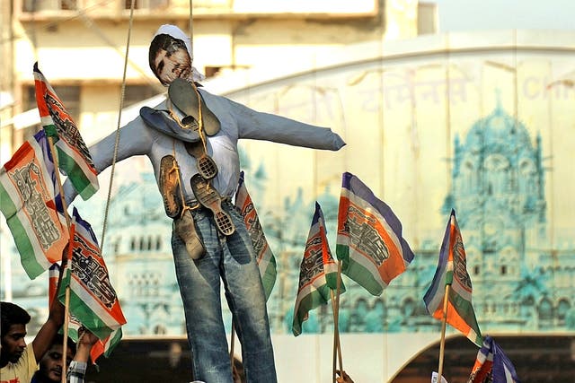 India's Maharashtra Navnirman Sena (MNS) activists hang an effigy of Ajmal Kasab