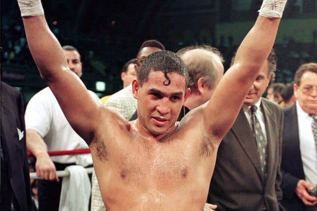 Camacho enjoying his win against Sugar Ray Leonard in 1997