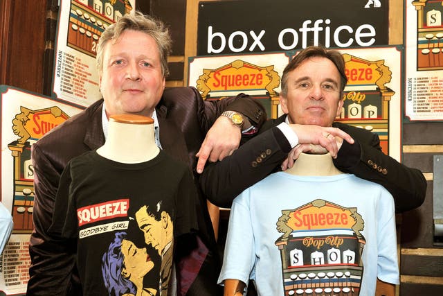 Glenn Tilbrook (left) and Chris Difford, the two founding members of the British band Squeeze, pose in their 'pop up shop'