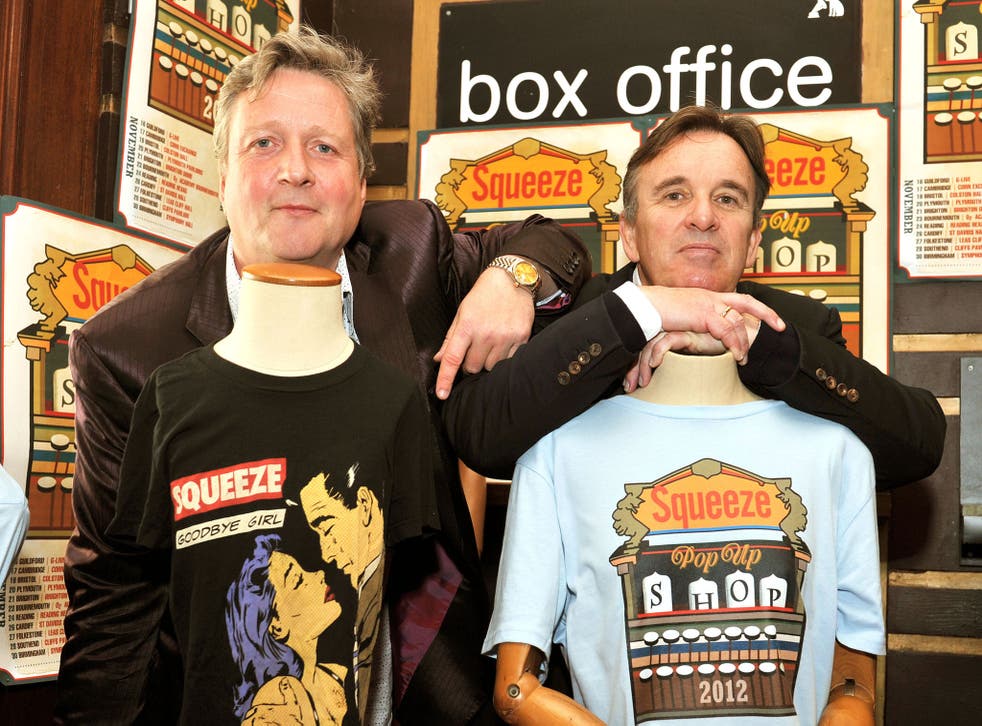 Glenn Tilbrook (left) and Chris Difford, the two founding members of the British band Squeeze, pose in their 'pop up shop'