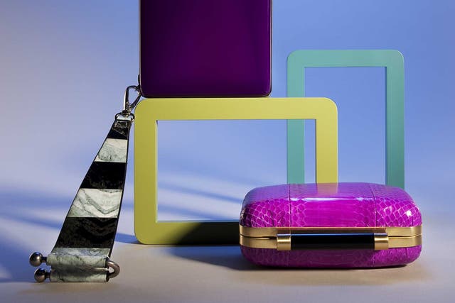 Square wristlet clutch by Kenzo, £230; pink clutch by DVF, £300, both from Selfridges; frames, from £5, John Lewis