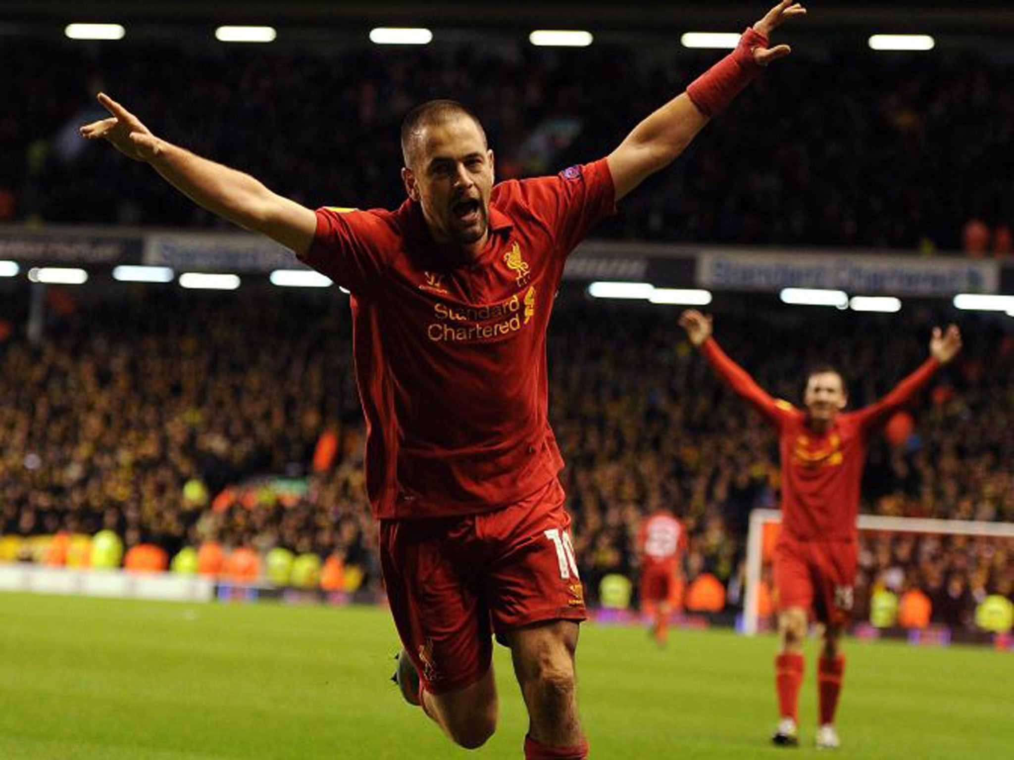 Joe Cole celebrates his first goal for Liverpool since April 2011
