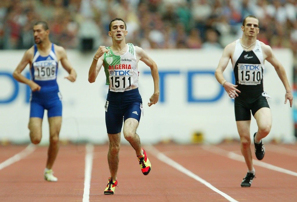 Mohamed Allek of Algeria leads the pack in the 400m Cerebral Palsy at the 9th IAAF World Athletics Championship August 28, 2003 in Paris