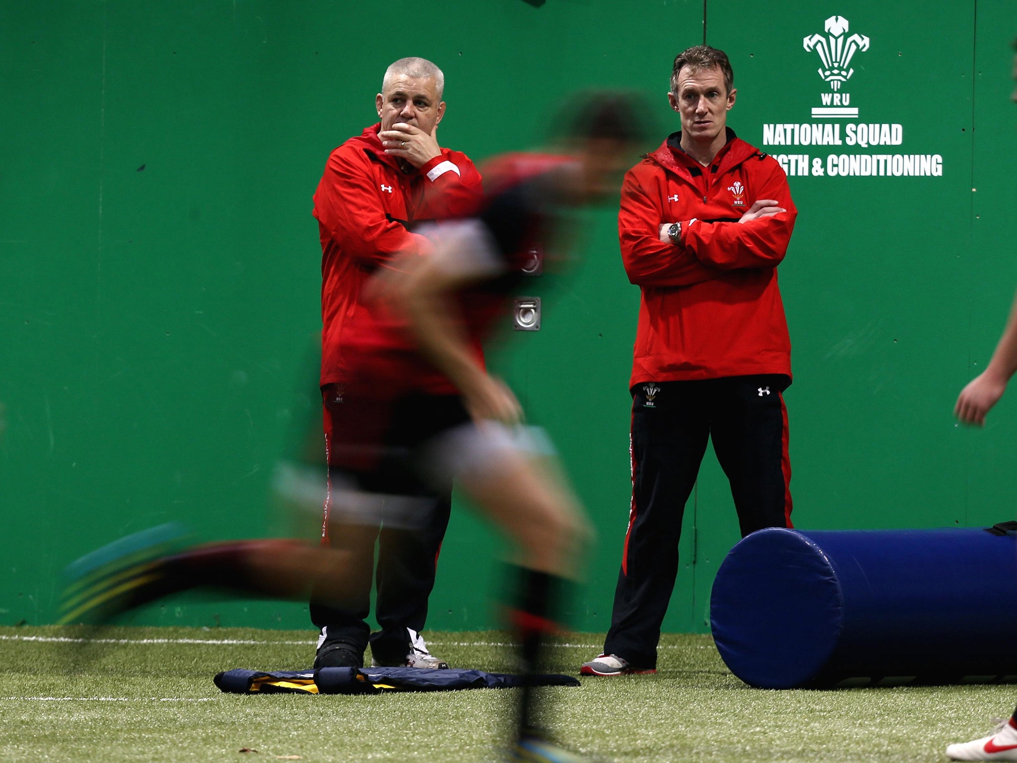 Warren Gatland (left) watches training with assistant Rob Howley