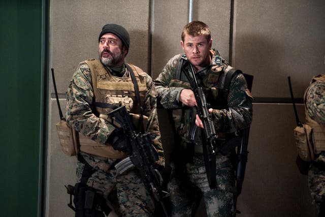 This film image released by Film District shows Jeffrey Dean Morgan, left, and Chris Hemsworth