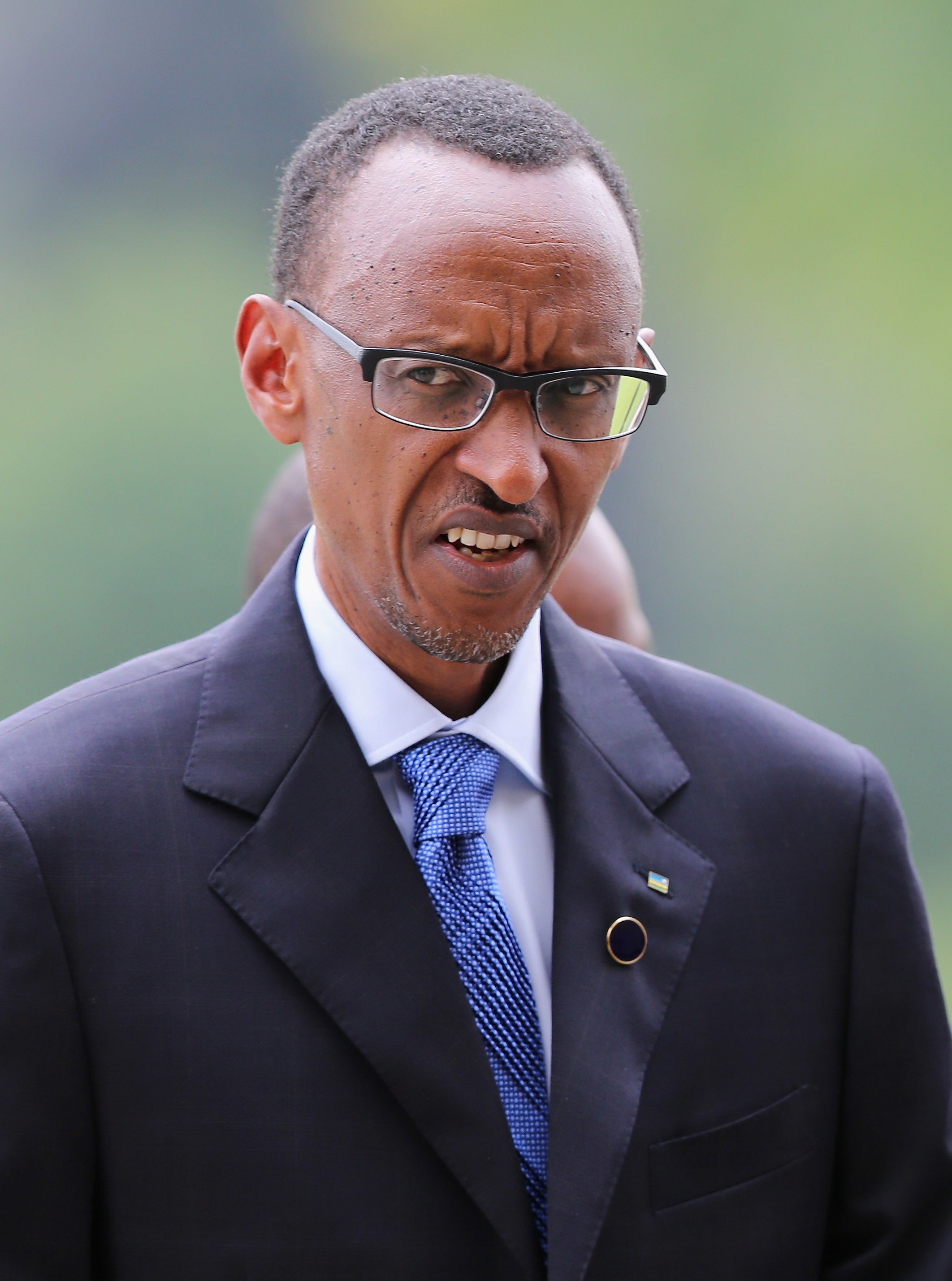 President Paul Kagame has been warned by David Cameron