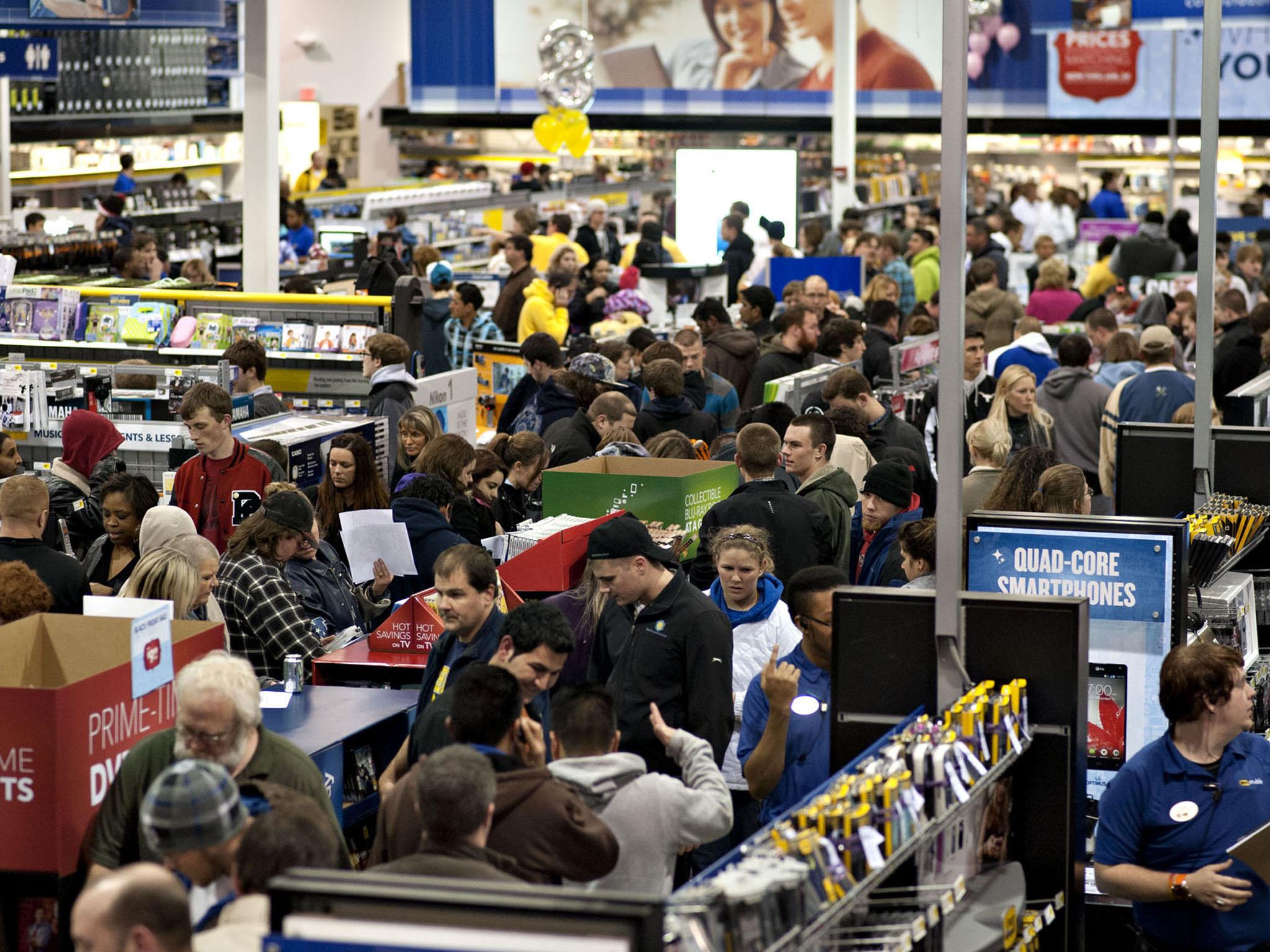BLACK FRIDAY: Shoppers browse inside a Best Buy Co. store in Peoria, Illinois
