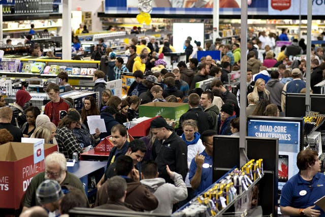 BLACK FRIDAY: Shoppers browse inside a Best Buy Co. store in Peoria, Illinois 
