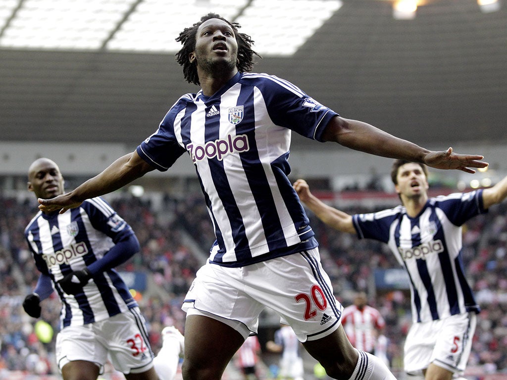 West Bromwich Albion's Belgian striker Romelu Lukaku (C) celebrates scoring their third goal against Sunderland