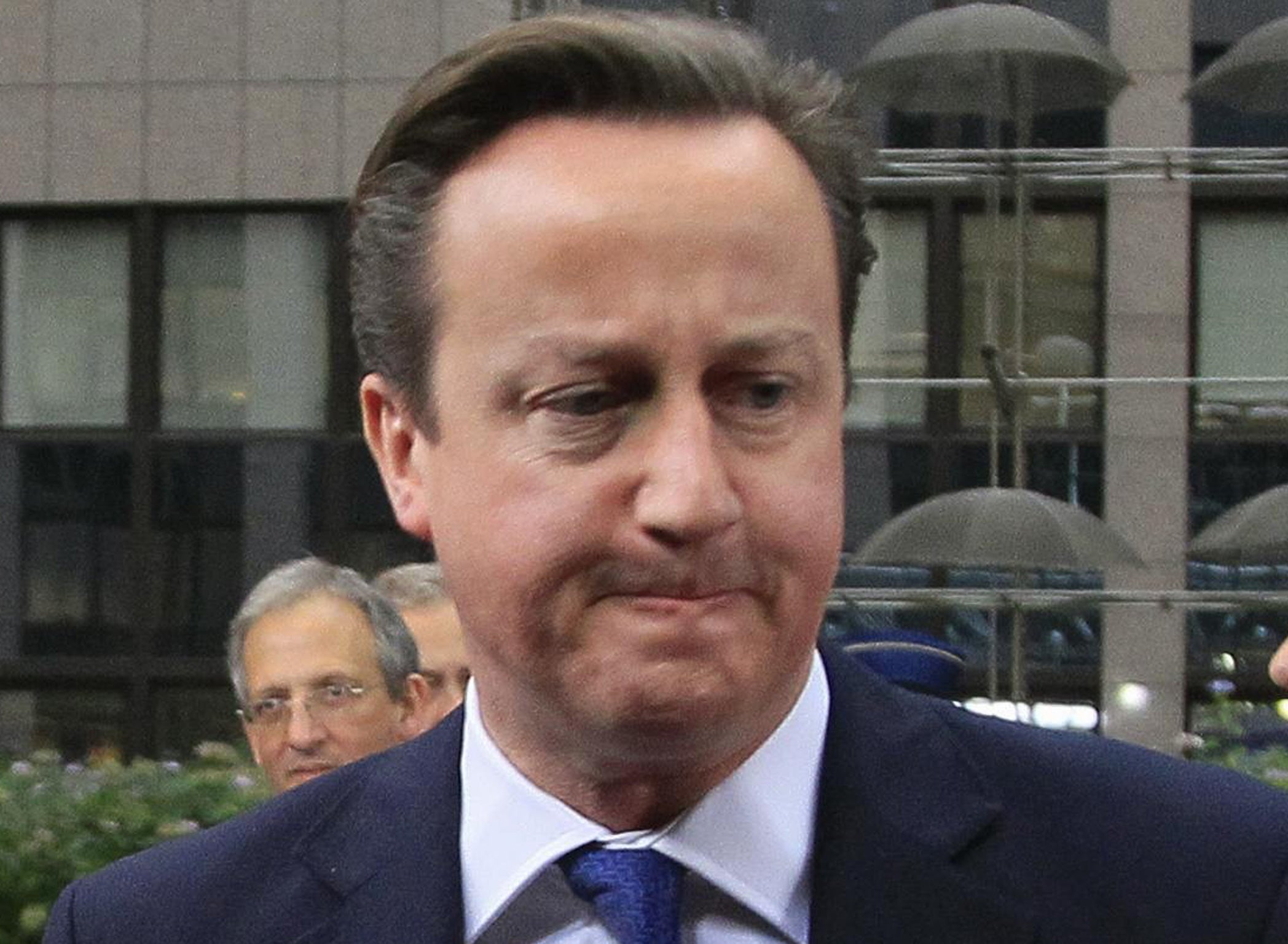 Outsider: The approach of David Cameron, pictured, may seem passive but it is right