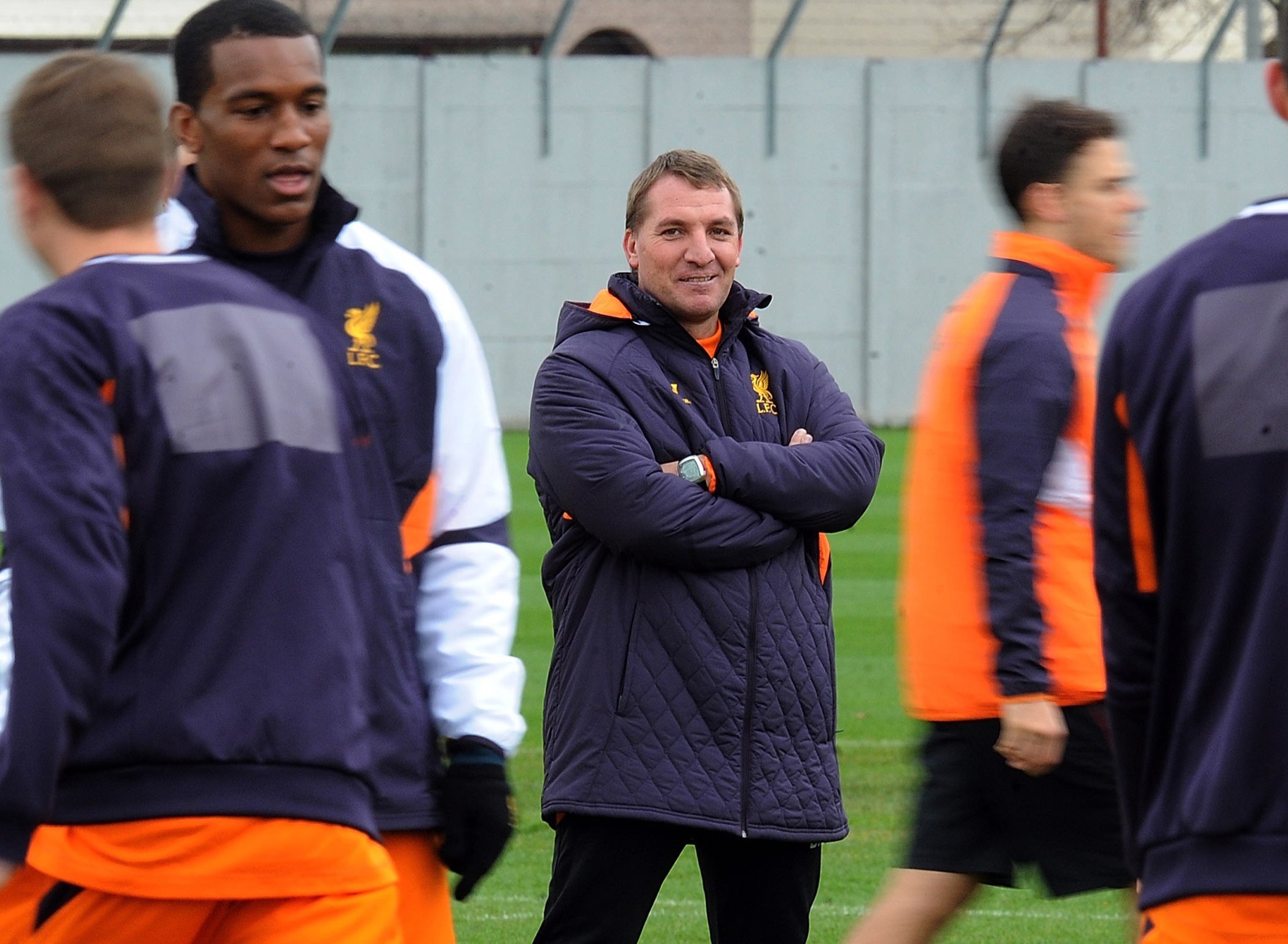 In the fold: Brendan Rodgers oversees Liverpool training at Melwood