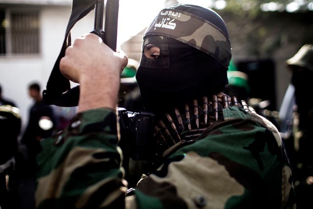Palestinian militants of Hamas' armed wing, the Ezzedine al-Qassam Brigades