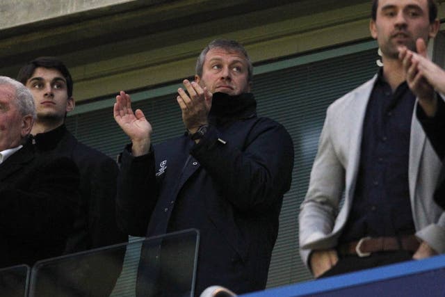 Chelsea's Russian owner Roman Abramovich awaits kick off during the English Premier League football match between Chelsea and Manchester City