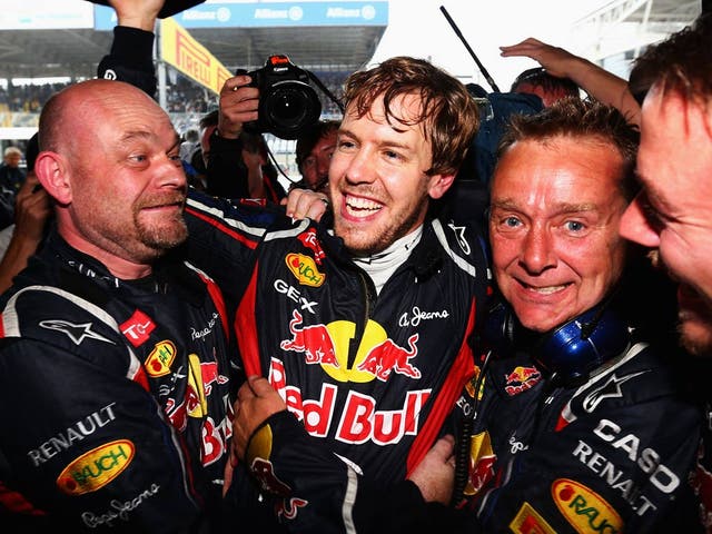 Sebastian Vettel celebrates winning his third world title