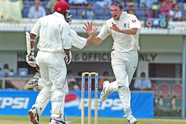 Steve Harmison of England celebrates taking the wicket