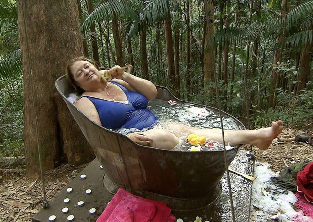 Rosemary Shrager leaves Hugo hanging around as she enjoys a bath in the jungle during a Dingo Dollar challenge.