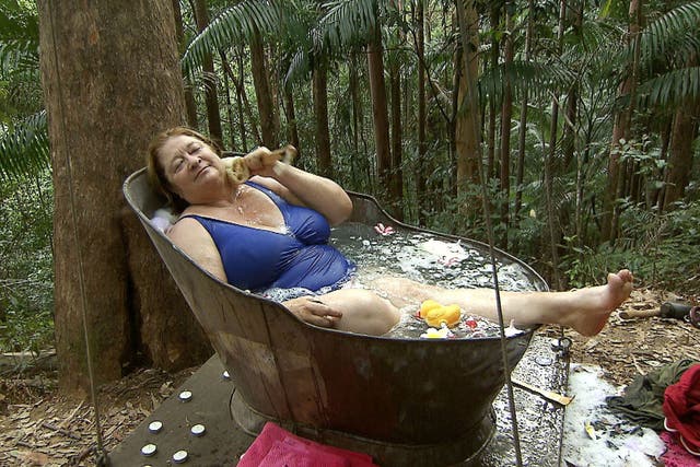 Rosemary Shrager leaves Hugo hanging around as she enjoys a bath in the jungle during a Dingo Dollar challenge.