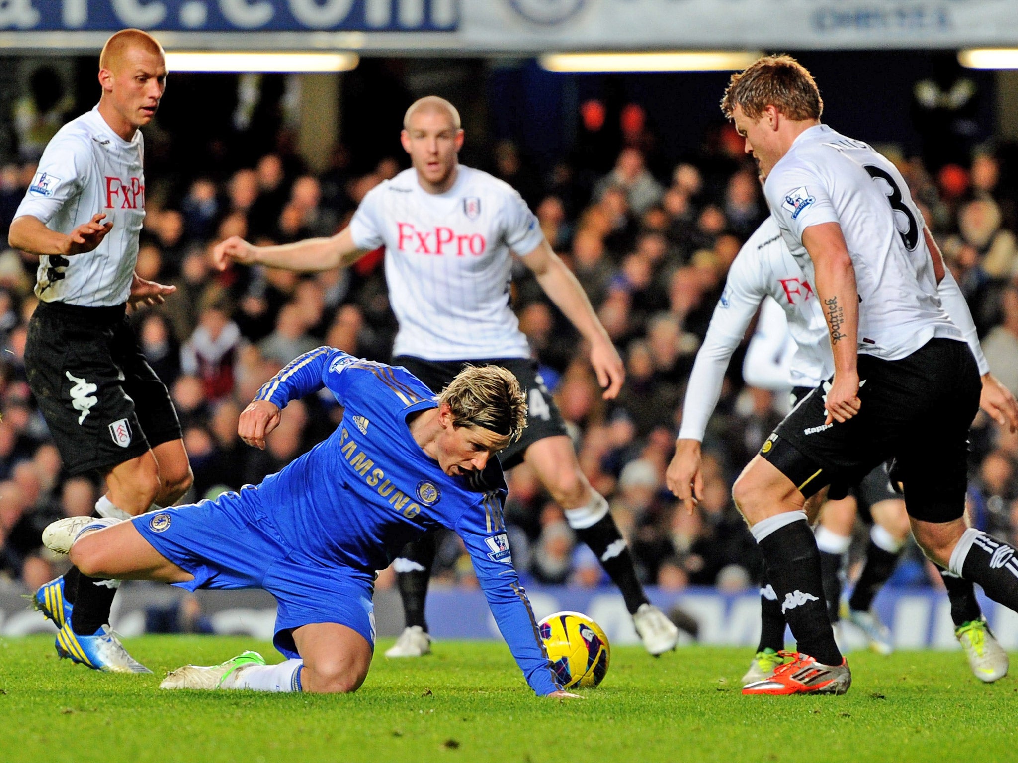 Chelsea’s Fernando Torres fails to find a way through the Fulham defence last night